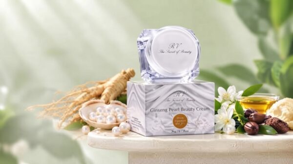 RV Ginseng Pearl Beauty Cream jar and product box displayed with raw ginseng root, white pearls, jasmine flowers, and cosmetic oils.